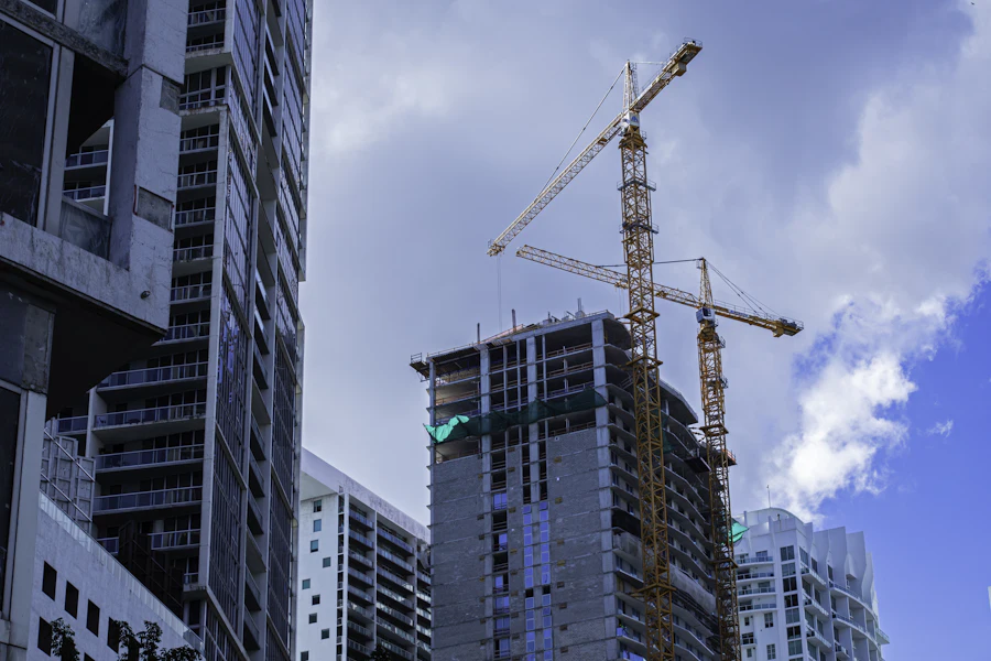 Tower cranes over high-rise buildings under construction